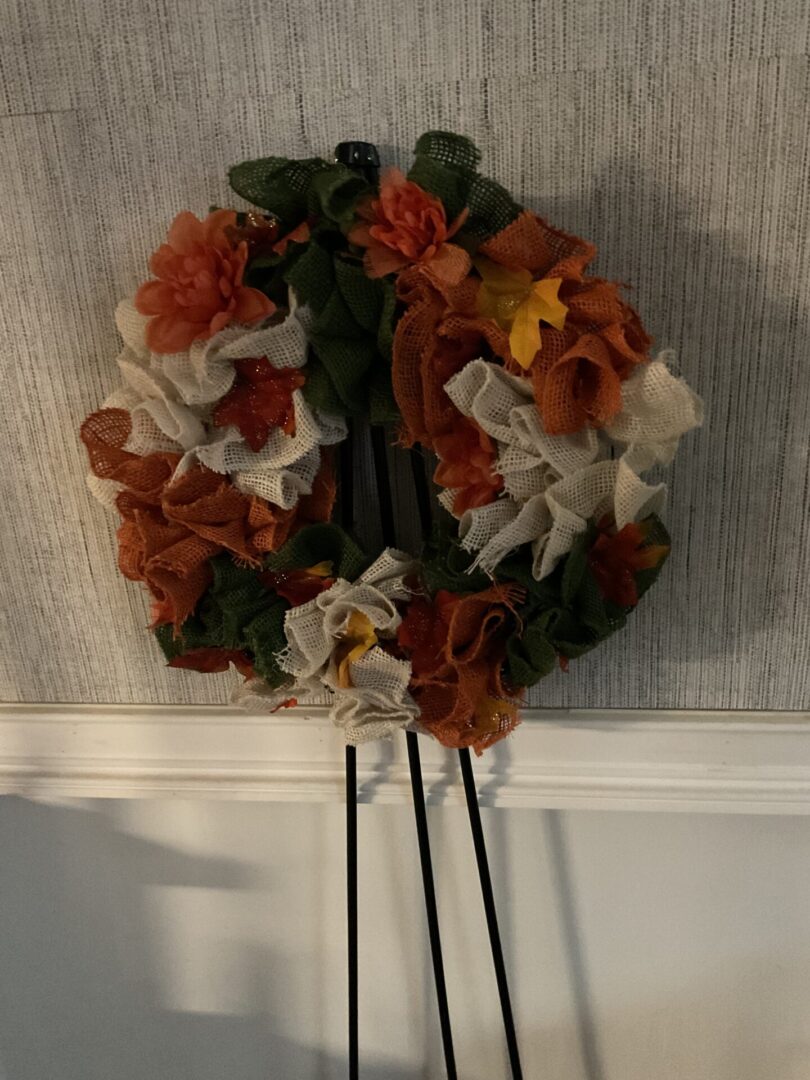 A wreath hanging on the wall of a room.