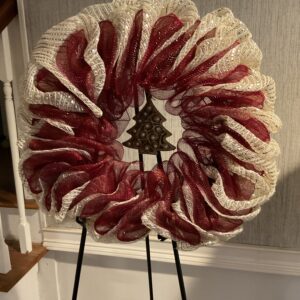 A wreath of meat on a stand