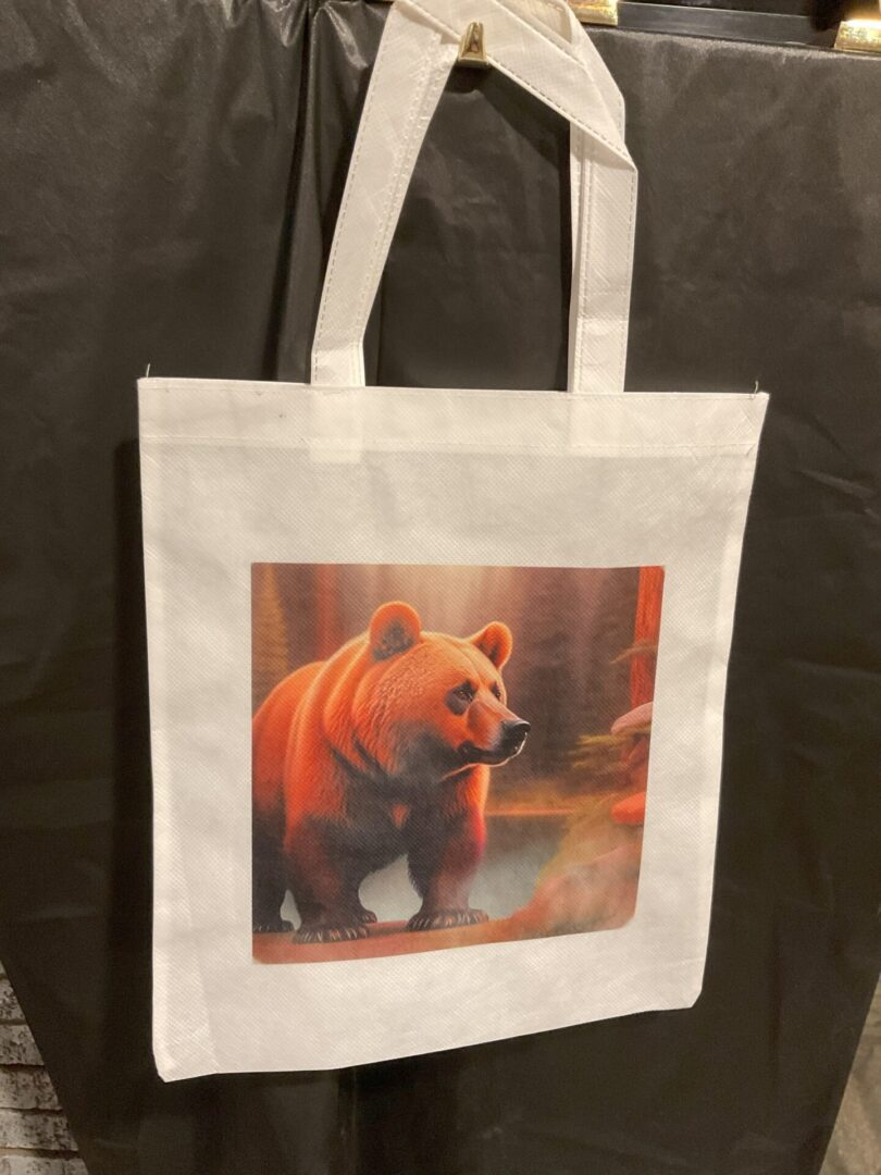 A bear is shown on the front of a bag.