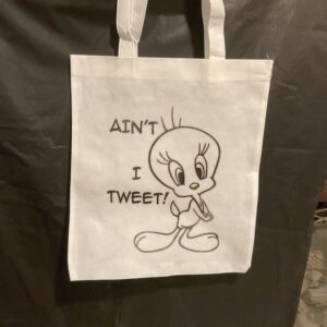 A bag that has tweety bird on it.