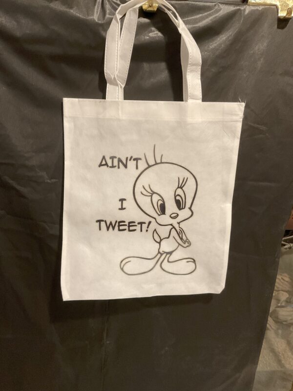 A bag that has tweety bird on it.