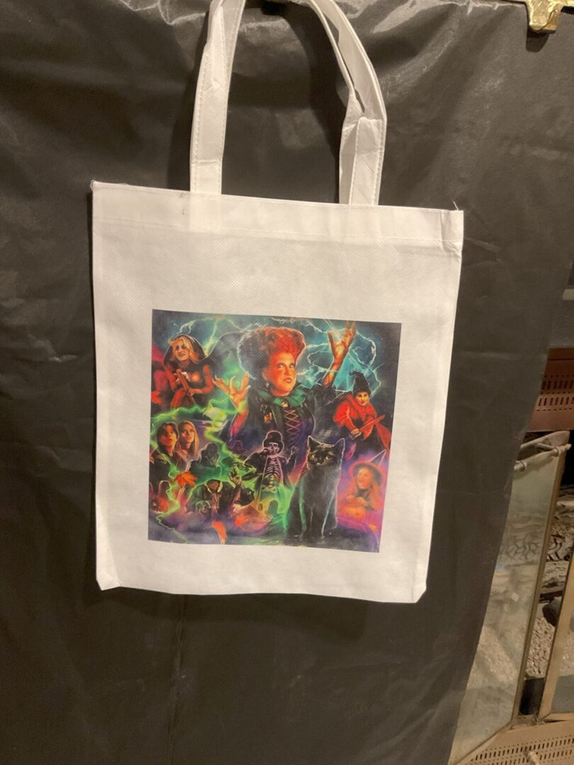 A bag with a picture of a person and some other people.