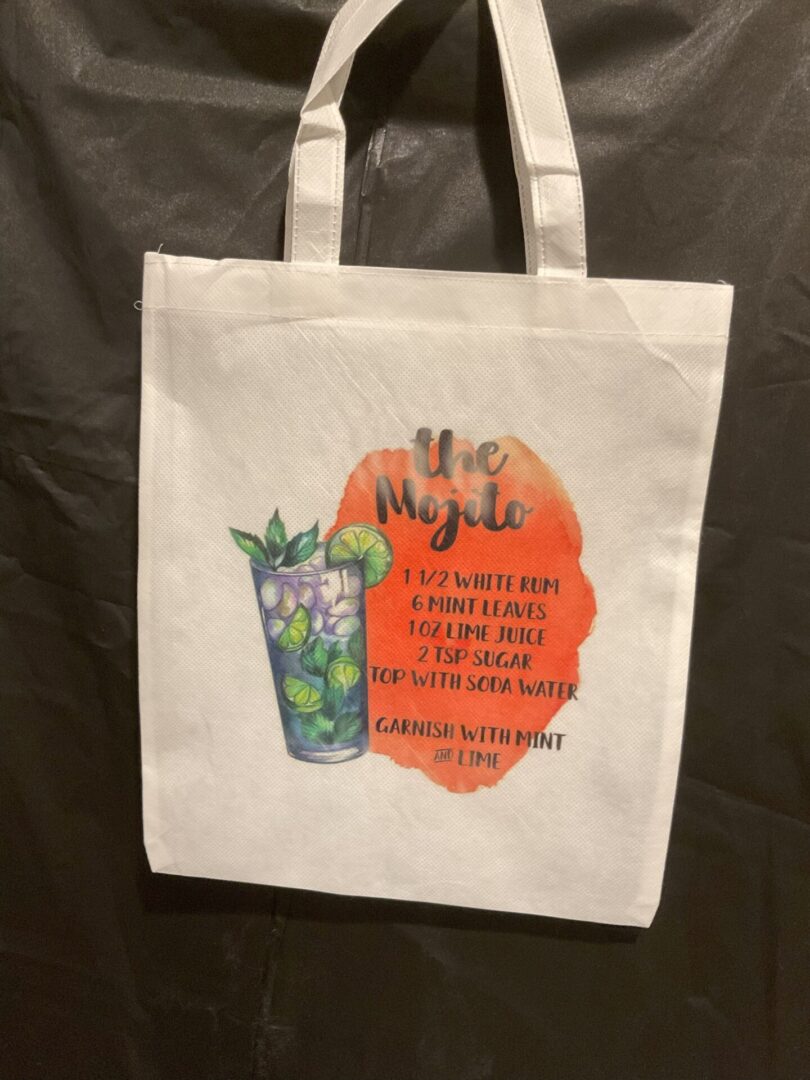 A bag with a picture of a drink and the words " mojito ".