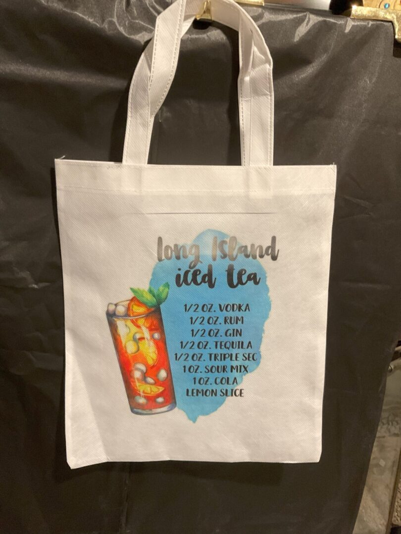 A white bag with a drink and ice tea on it.