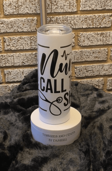 A candle that says nu call s on it.