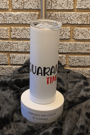 A white cup with the words " quarantime times ".