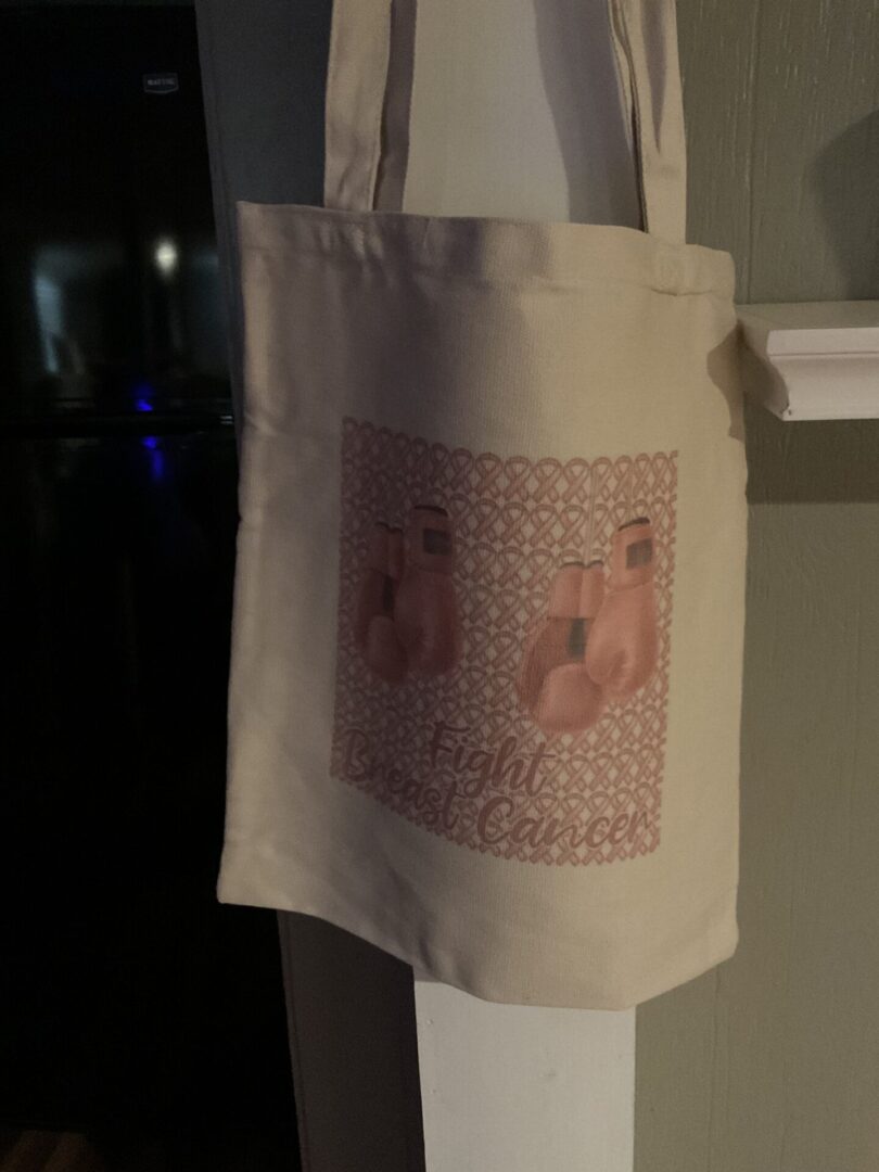 A bag hanging on the wall with pink socks